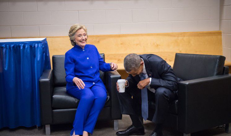 Obama and Hillary laughing their pants off.